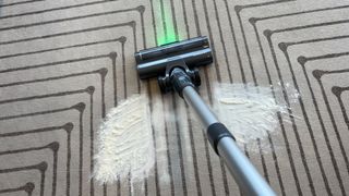 vacuuming flour on rug