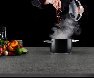 invisible hob in black ceramic worktop