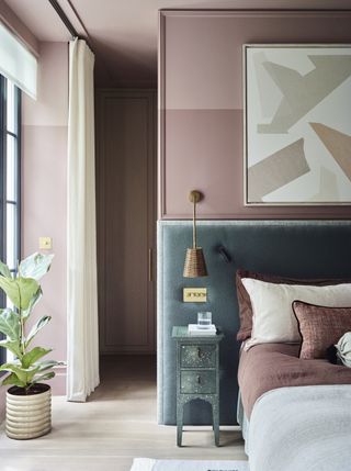 pink bedroom with two tone walls by Gunter & Co