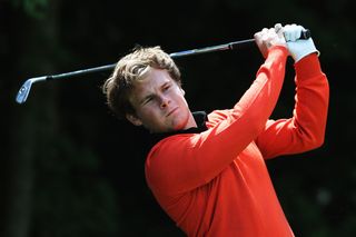 Tyrrel Hatton hits golf shot on the Challenge Tour