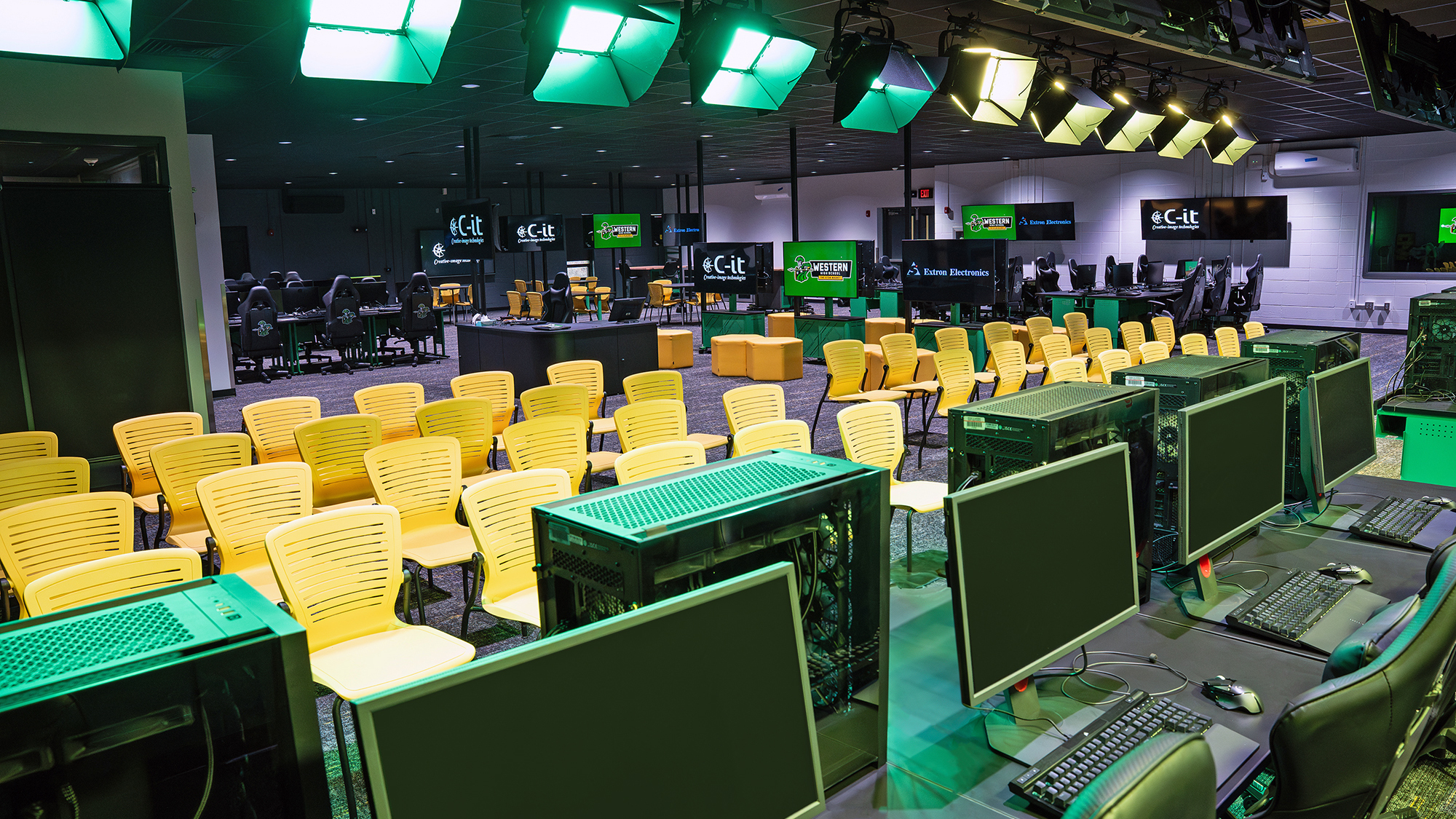 Western High School's neon green and yellow esports lounge.