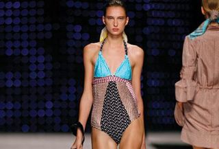 model on runway in missoni swimsuit