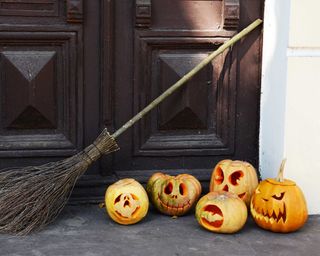 carved pumpkins on doorstep
