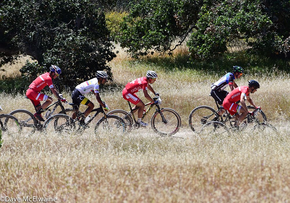 Christoph Sauser (Specialized) attacked the leading group at the base of the final climb on lap one.