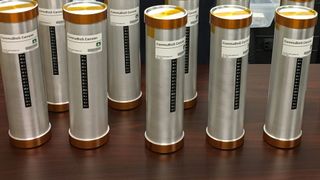 The wine bottles were shipped to the space station inside these canisters.