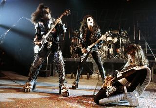 UNSPECIFIED - DECEMBER 01: Photo of Paul STANLEY and KISS and Gene SIMMONS and Ace FREHLEY; Gene Simmons, Paul Stanley and Ace Frehley performing live onstage 01 December, 1975