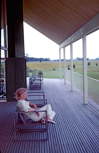 Bodil Kjaer at Otter Creek, Indiana, sitting on a patio on one of her chairs