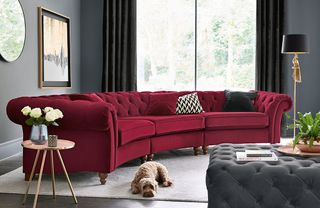 curved extra large sofa in dark red plush velvet