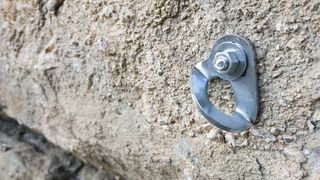 what's more difficult, sport climbing or trad climbing: A climbing bolt in the rock