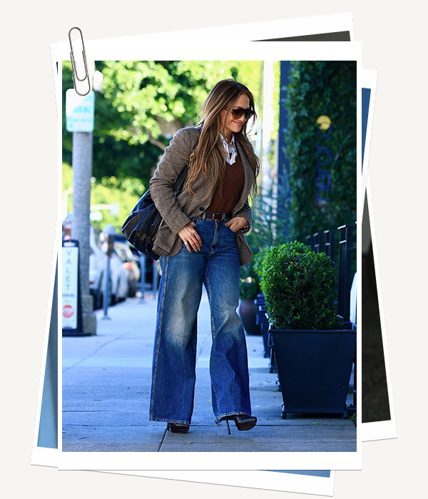 Jennifer Lopez wearing wide-leg jeans