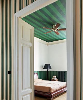 Ceiling wallpaper in bedroom by Farrow and Ball