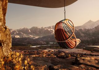 Outdoors hanging furniture swing overlooking mountains at sunset
