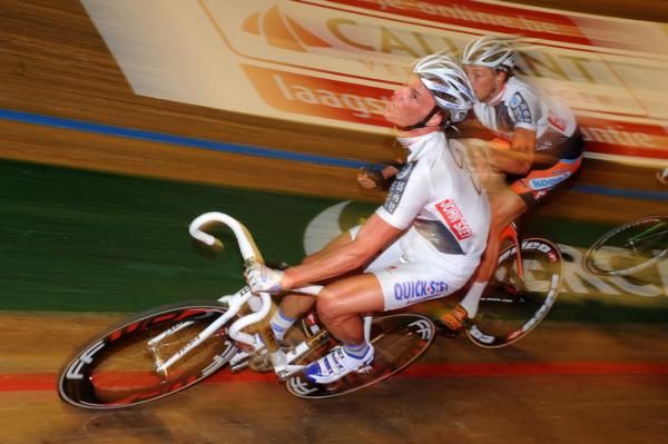 Iljo Keisse slings partner Peter Schep into the action.