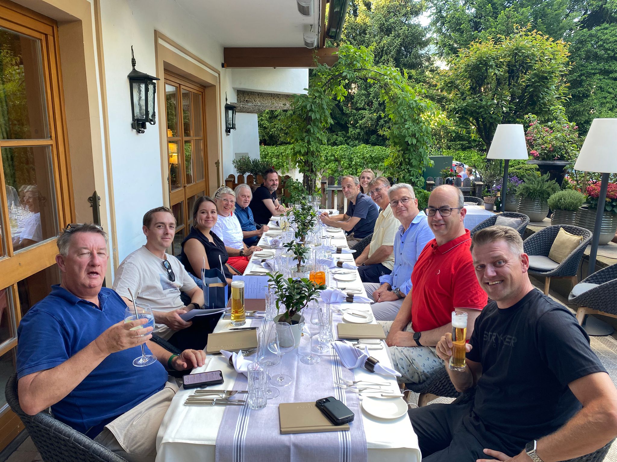 Jonny Leighfield smiles as part of a group photo in Austria 2026