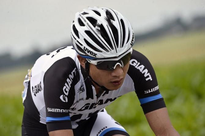 China's Cheng Ji (Giant-Shimano) rides in the pack