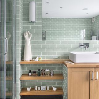 green metro tiled bathroom wall large mirror vanity unit shelf built in basin ornamental porcelain arm