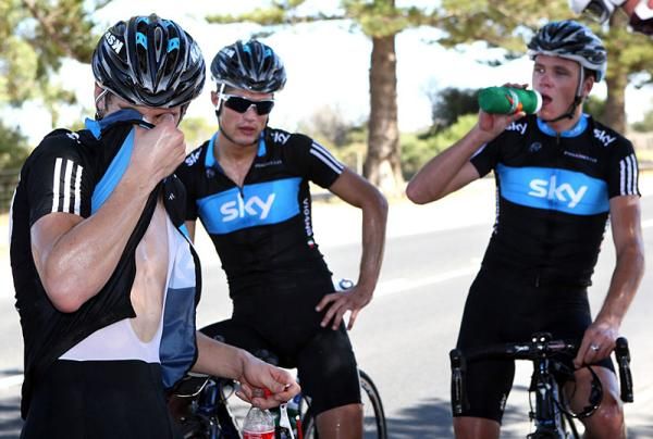 Sky's Davide Vigano and Chris Froome take a break during training in Australia.