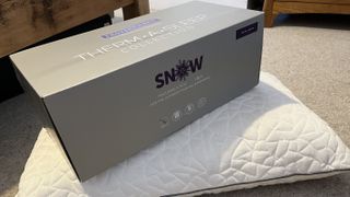 remfit snow pillow with box on floor