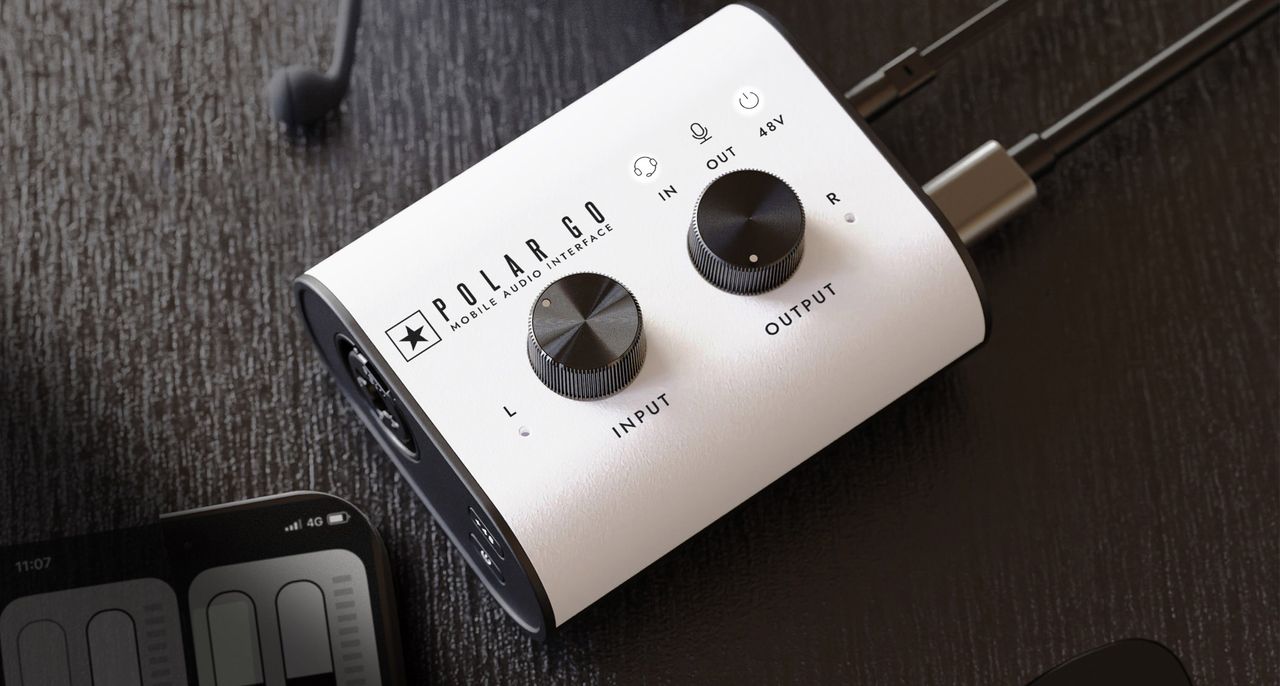 Blackstar Amplification Polar Go: the super-compact audio interface has a white fascia, black knobs and sides, and is small enough to fit inside the palm of your hand.