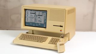 An Apple Lisa home computer with GUI displayed.