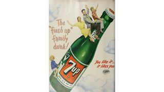Print ad depicting a family riding a huge bottle of 7up
