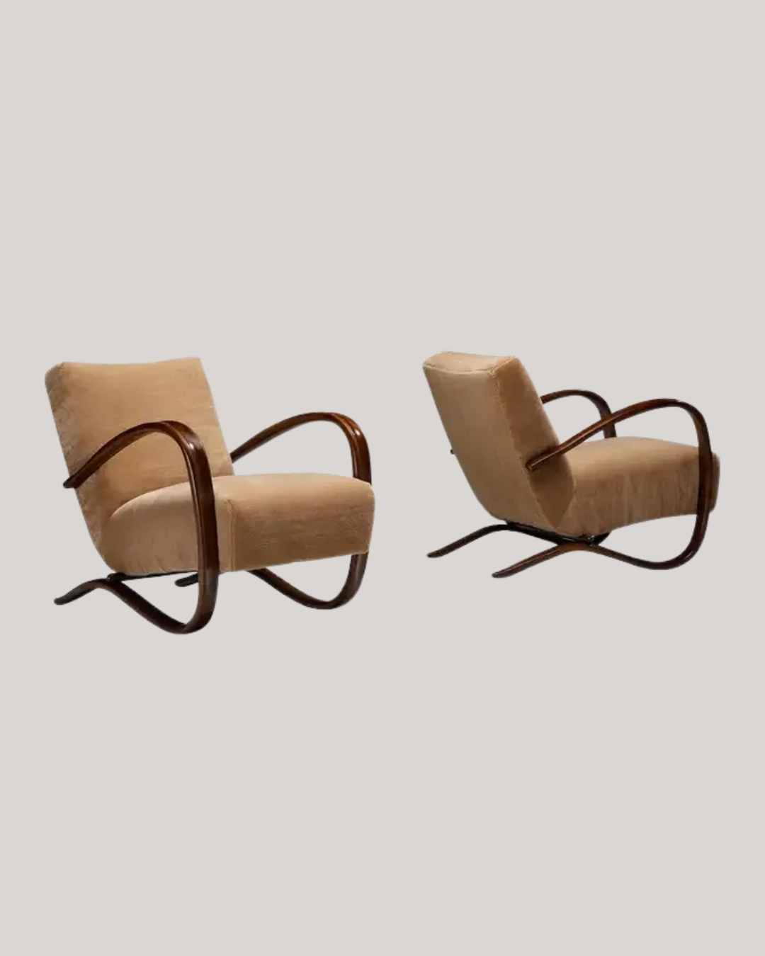 Jindrich Halabala Lounge Chairs Upholstered in Brown Pierre Frey Mohair against gray background.