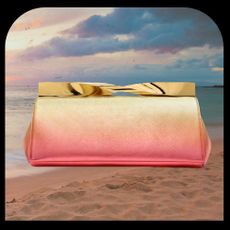 Graphic of Fashion Test Drive franchise featuring Aquazzura's Twist Clutch on a beach background.
