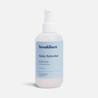 A bottle of Brooklinen laundry fabric spray