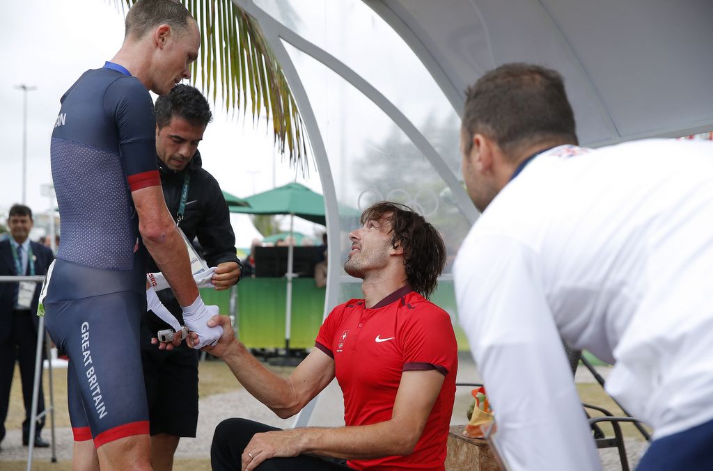 Chris Froome (Great Britain) congratulates Fabian Cancellara on his victory