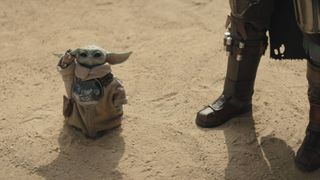 Grogu saluting in The Mandalorian and Grogu