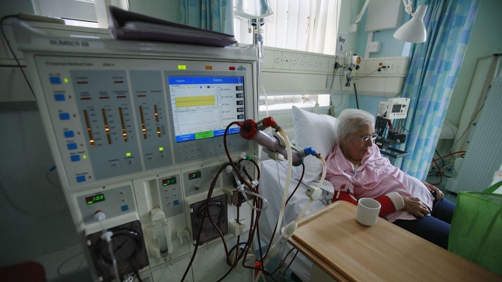 A person receives dialysis treatment.