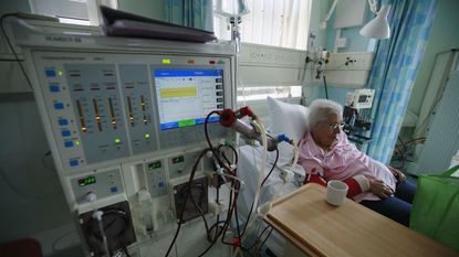 A person receives dialysis treatment.