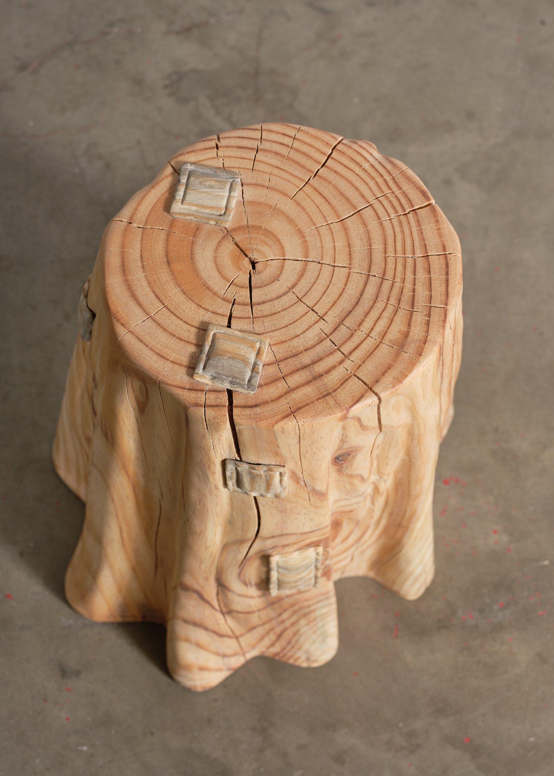 Wooden stool made of wildfires wood, by Sam Klemick