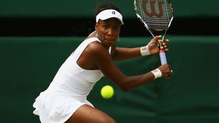 Venus Williams of United States plays a backhand during the women's singles Final match against Serena Williams of United States on day twelve of the Wimbledon Lawn Tennis Championships at the All England Lawn Tennis and Croquet Club on July 5, 2008 in London, England.