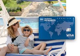 a picture of a family on a hammock with the Best Western Rewards Premium Visa Signature card