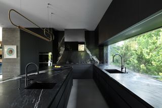 A marble and fenix kitchen