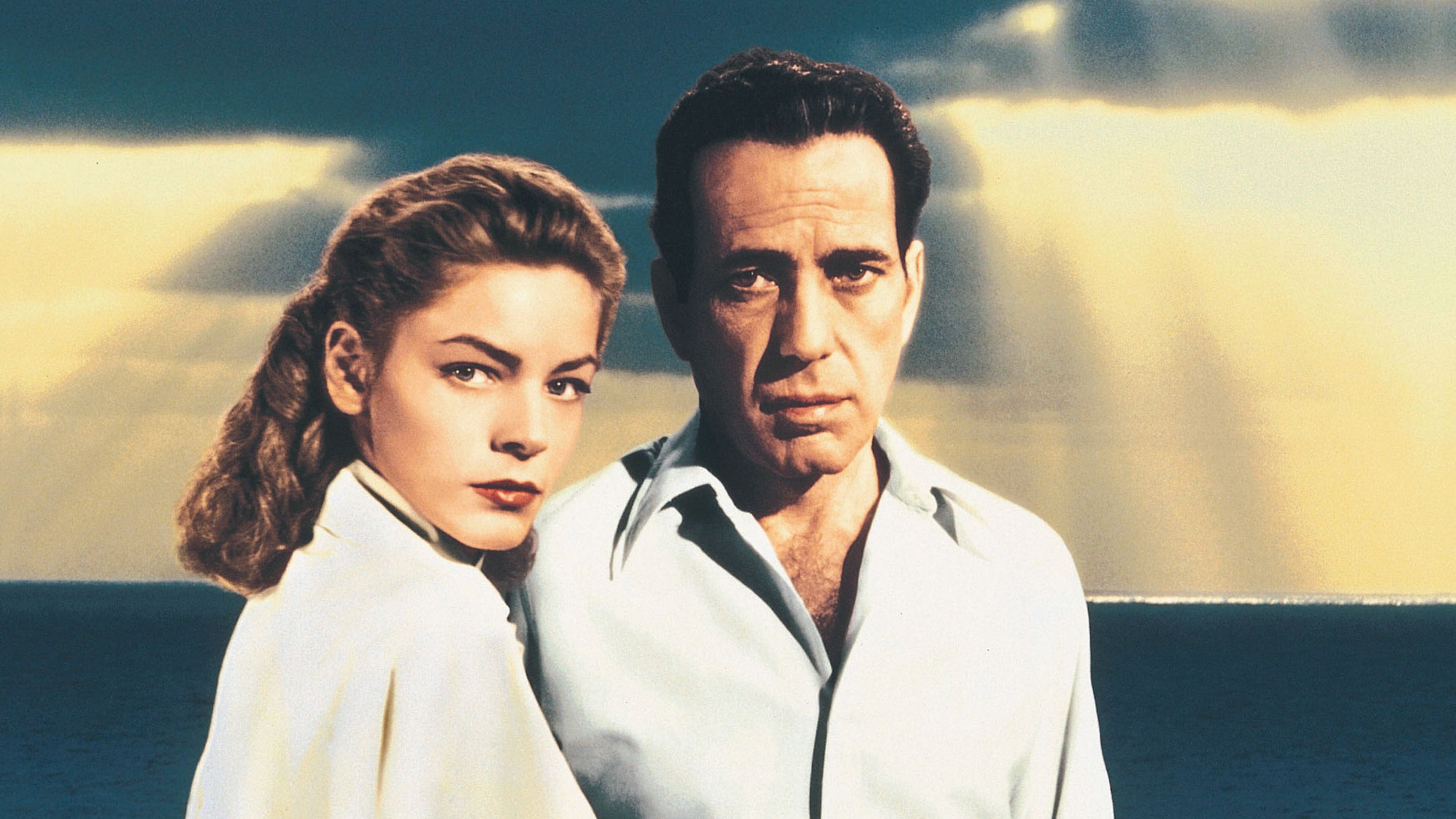 humphrey bogard and lauren bacall on a ocean background