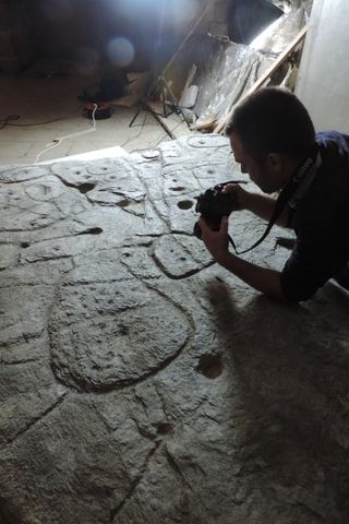 Researchers analyzed the engravings on the prehistoric stone slab.