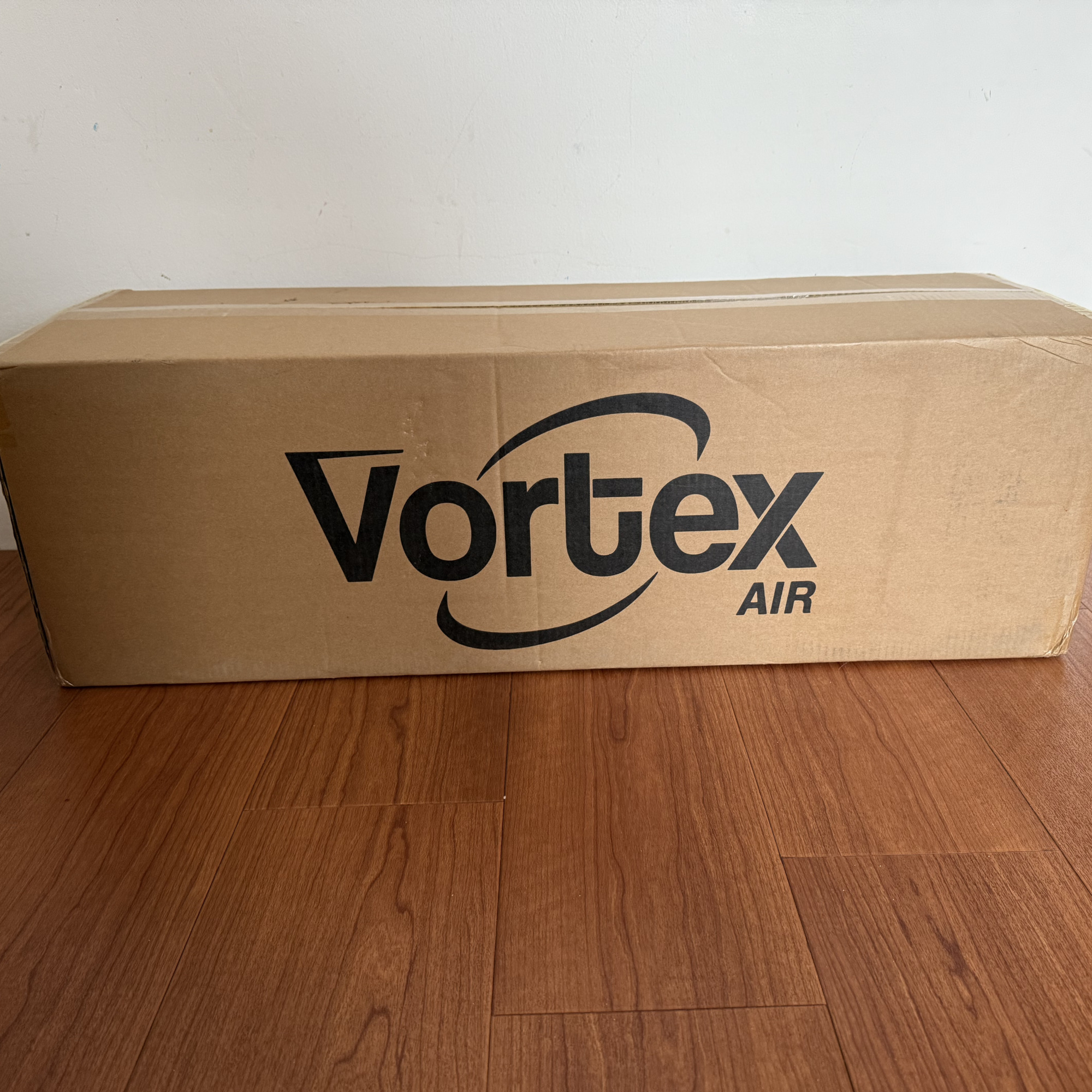 vortex air cleanse box on a wood floor