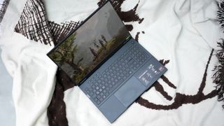 An Asus TUF Gaming A16 2025 on a white background, fit with an RTX 5050.