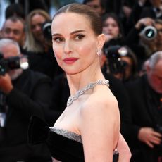 Natalie Portman wearing a tiffany necklace and dior dress