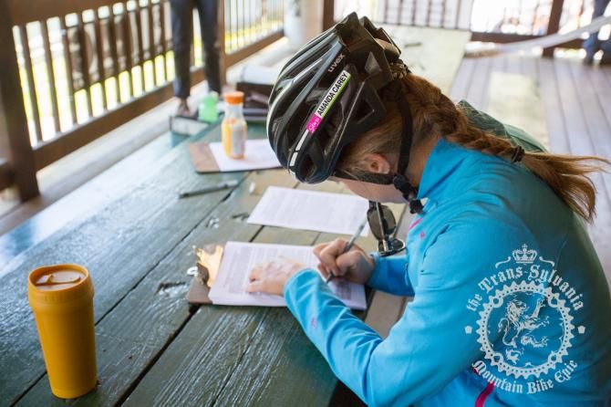 Amanda Carey signs in for seven days of racing at the Trans-Sylvania Epic