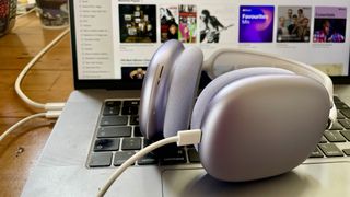 AirPods Max in purple hooked up to a source via USB-C