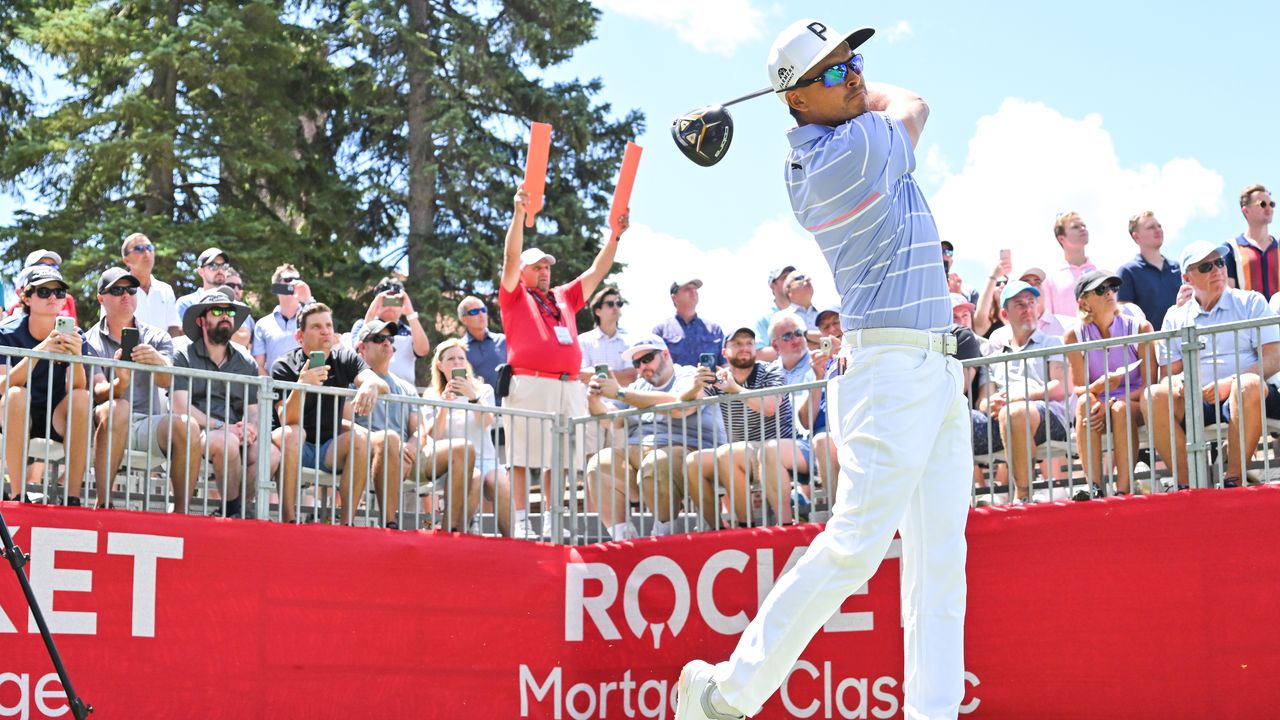 Rickie Fowler takes a tee shot in the second round of the 2023 Rocket Mortgage Classic