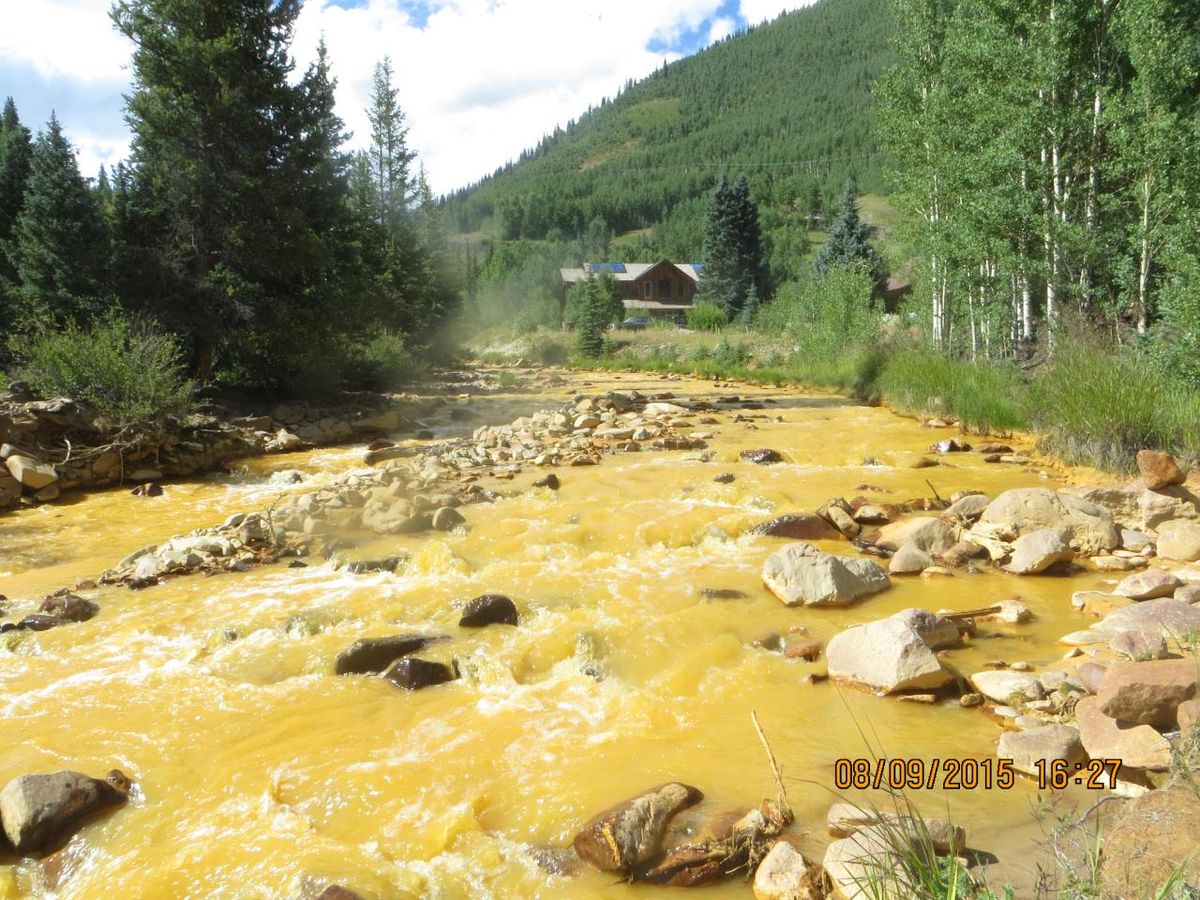 Photo of Cement Creek in Silverton, Colorado, after the Gold King Mine contaminated it with toxic water.