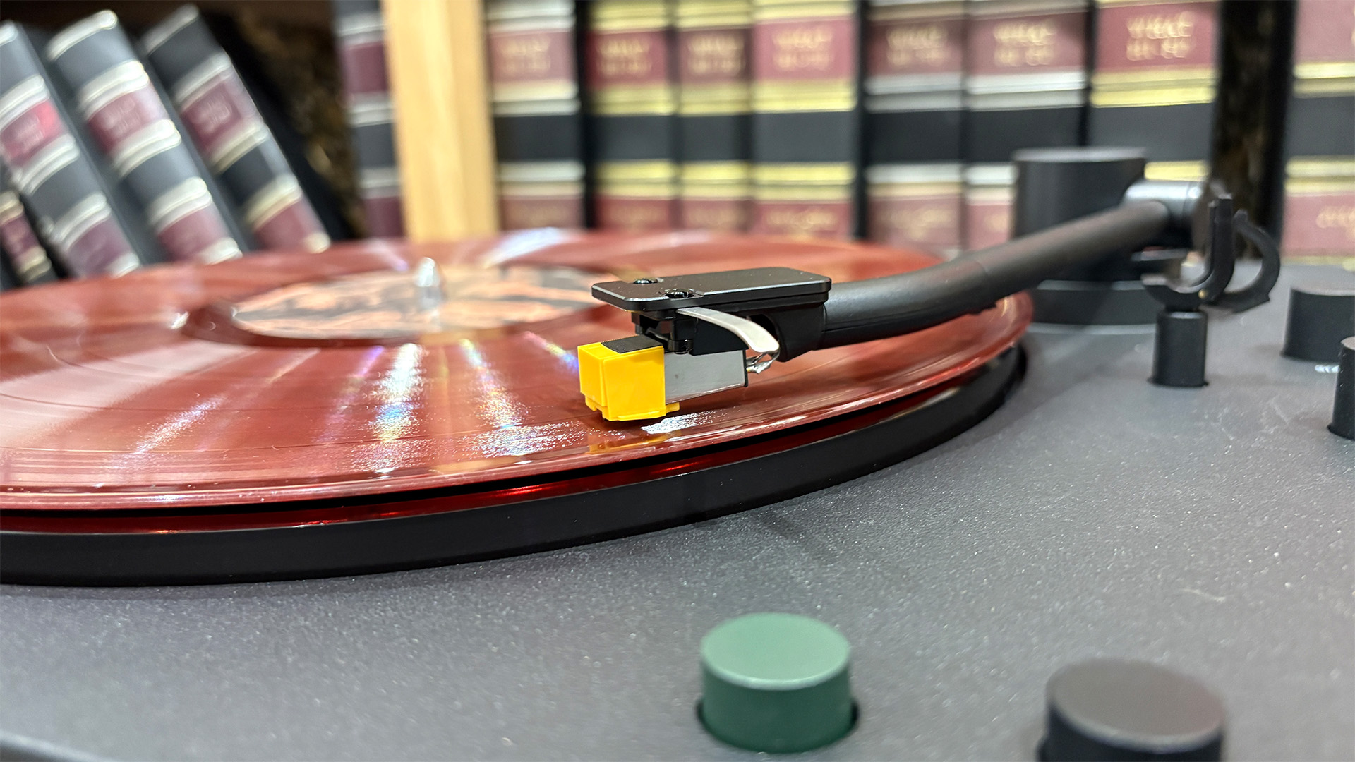 Sony PS-LX5BT Bluetooth turntable playing plum coloured vinyl