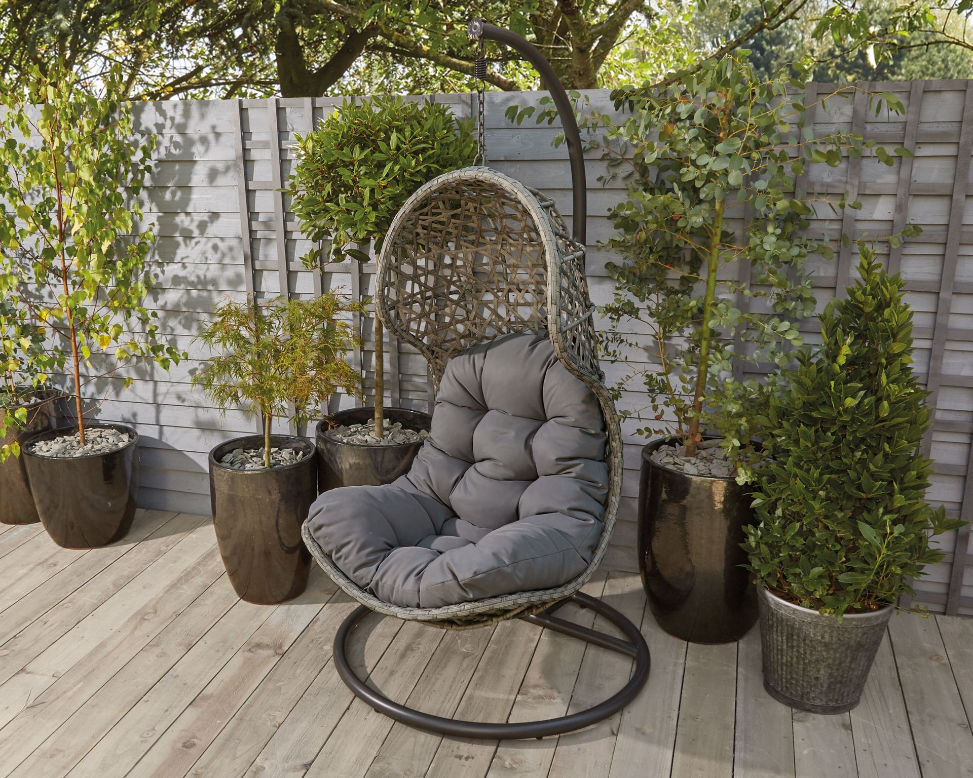 Morrisons' Rattan Hanging Pod Chair is the perfect Aldi dupe Gardeningetc