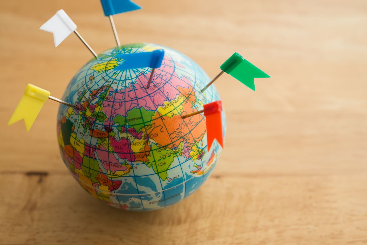 Globe with pins in countries