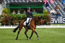 Eventing dressage scoring: Tom McEwen on his way to second place after the first day of dressage with Toledo De Kerser