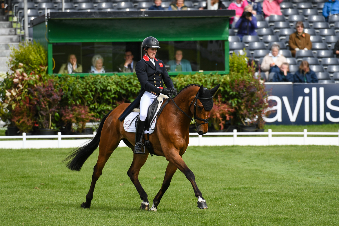 Eventing dressage scoring: Tom McEwen on his way to second place after the first day of dressage with Toledo De Kerser